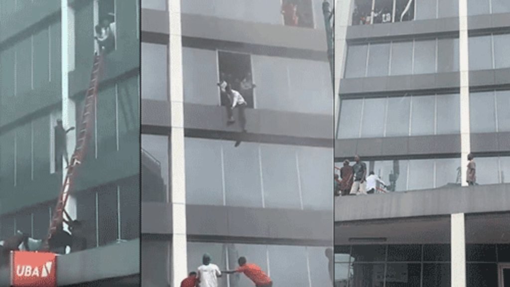 Firefighters rescuing victims during Afriland Towers fire in Lagos.