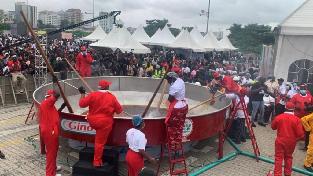 Hilda Baci cooking giant pot of Jollof rice at Eko Hotel Lagos.